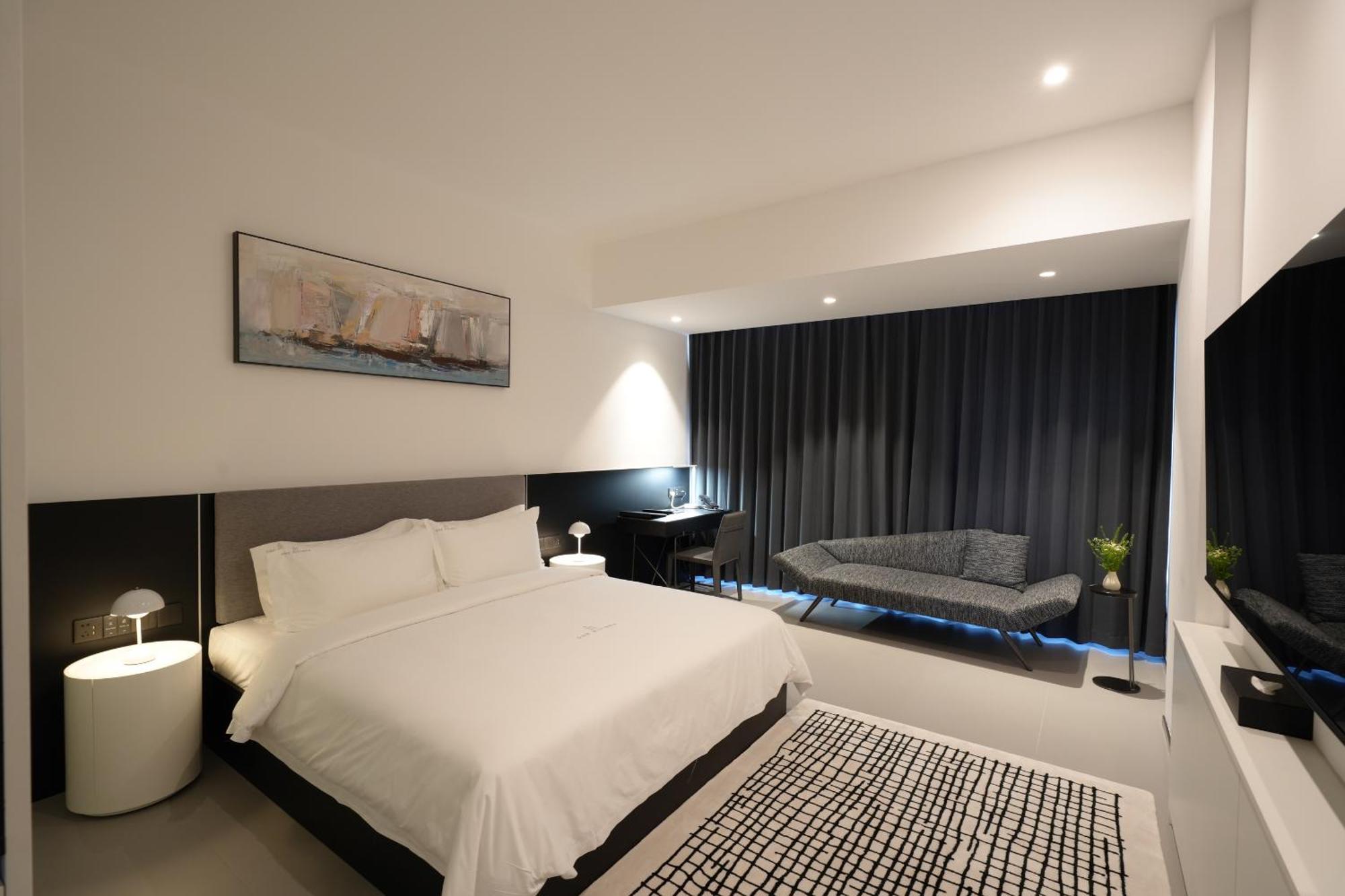 One Riviera Hotel And Residences Ban Souanmone Exterior foto
